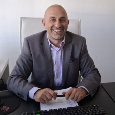 Dr. Constantinos Stylianides